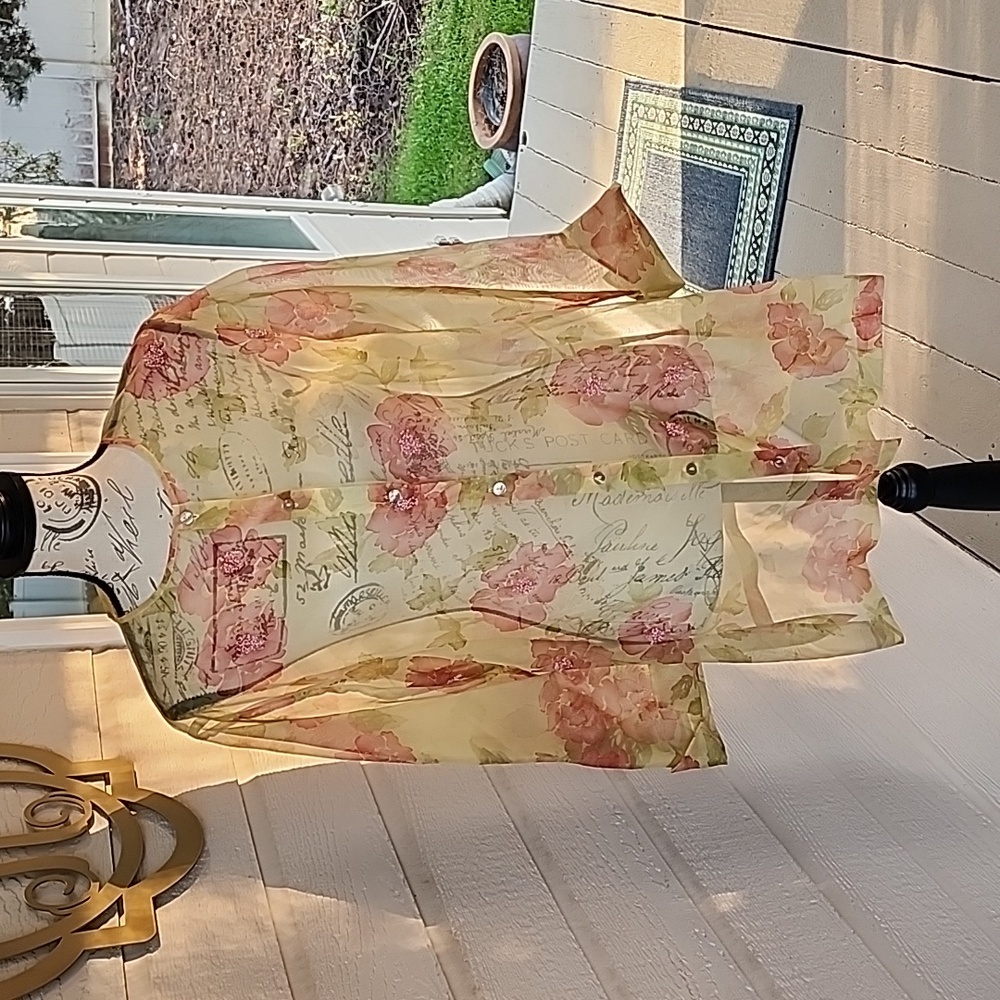 100% silk sheer jacket/blouse with beading.